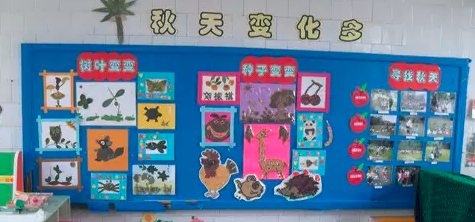 将秋季的各种果实和收纳围巾圈结合在一起挂在班级的门框上,可以做